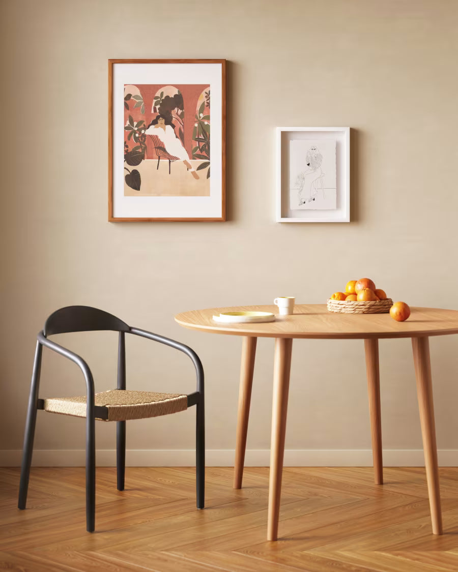 Nina Stackable Chair in Black Finish.