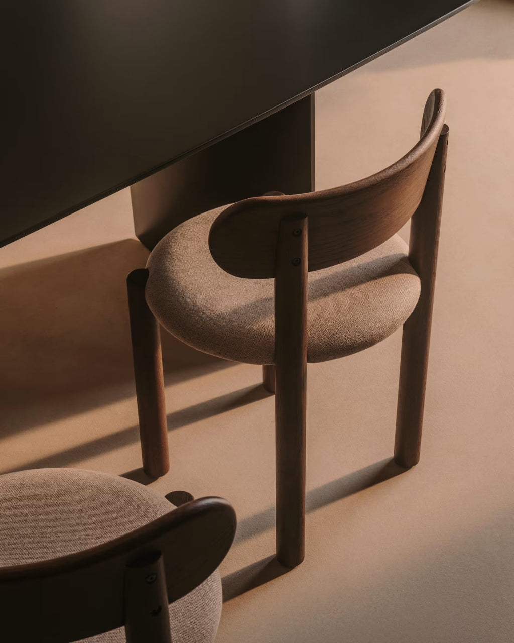 Nebai chair in brown chenille with a solid oak wood and walnut finish