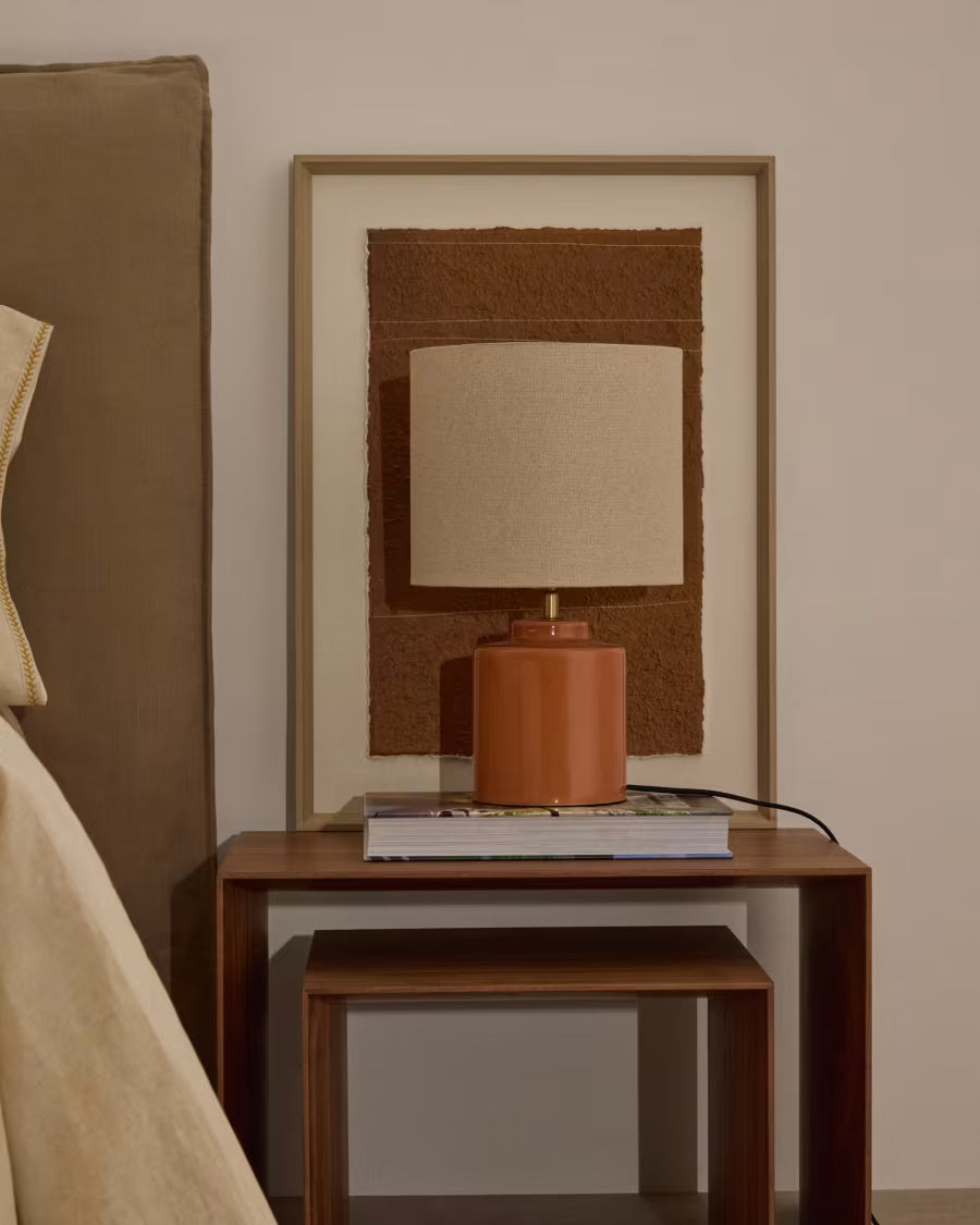 Daeli ceramic table lamp with orange finish and beige cotton