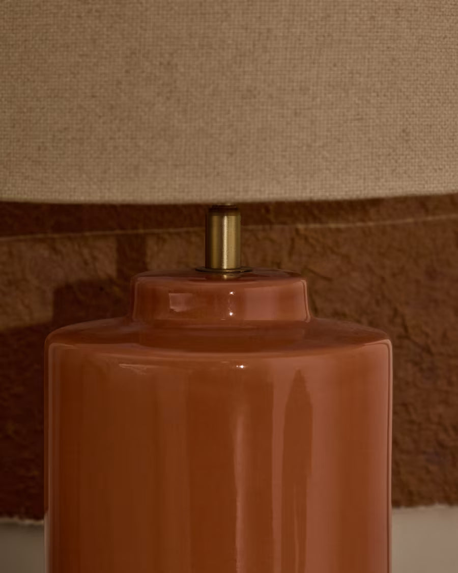 Daeli ceramic table lamp with orange finish and beige cotton
