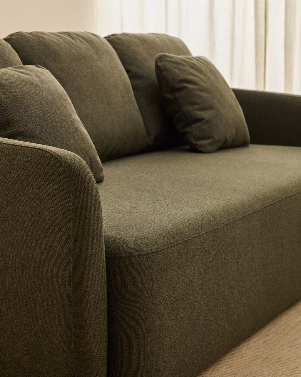 Laira 3-Seater Sofa Bed in Dark Green.