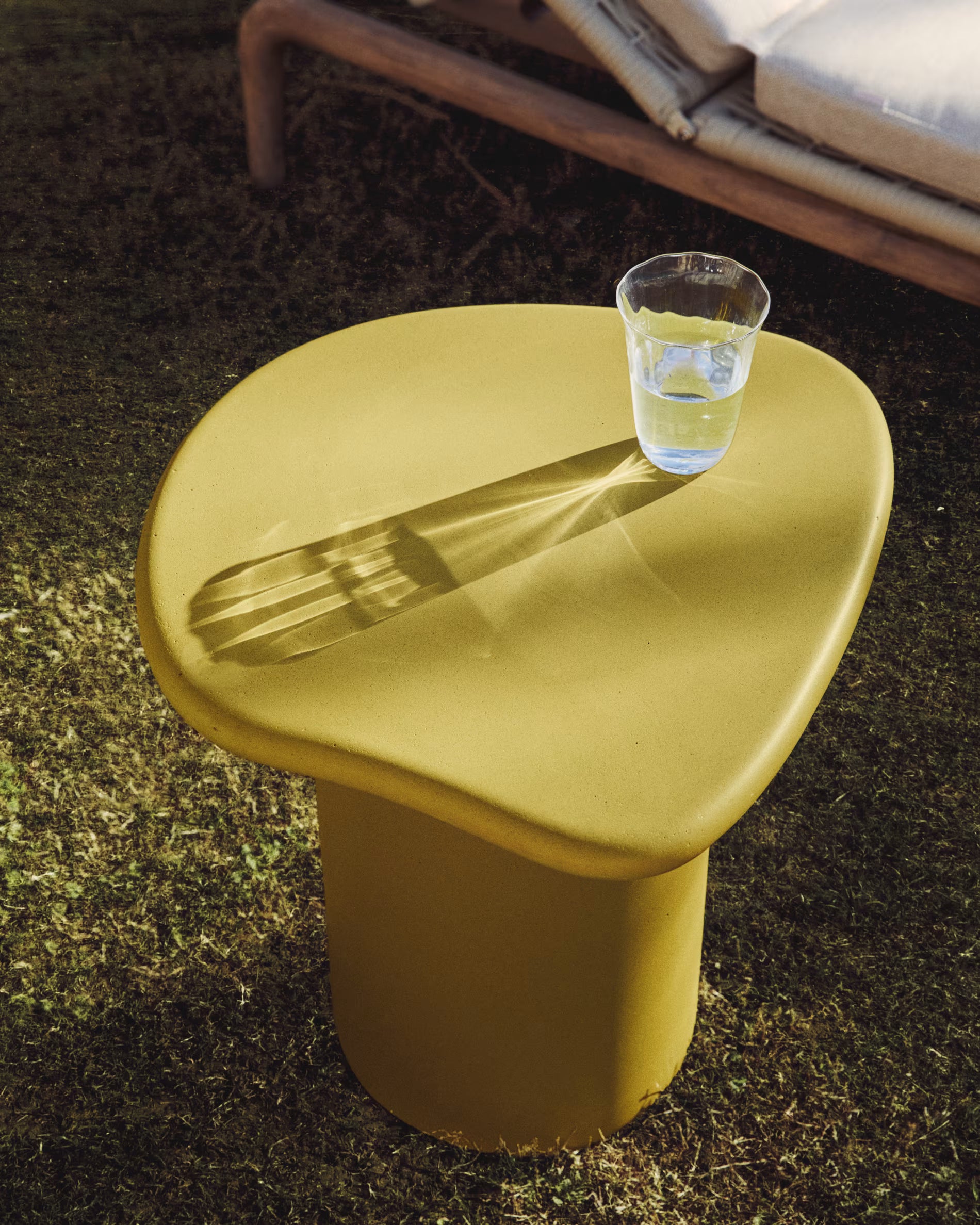 Macarella side table in mustard concrete 48 x 47cm.