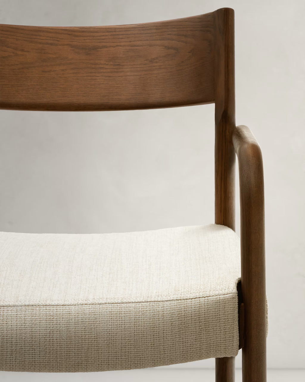 Falconera Chair in Walnut Finish.