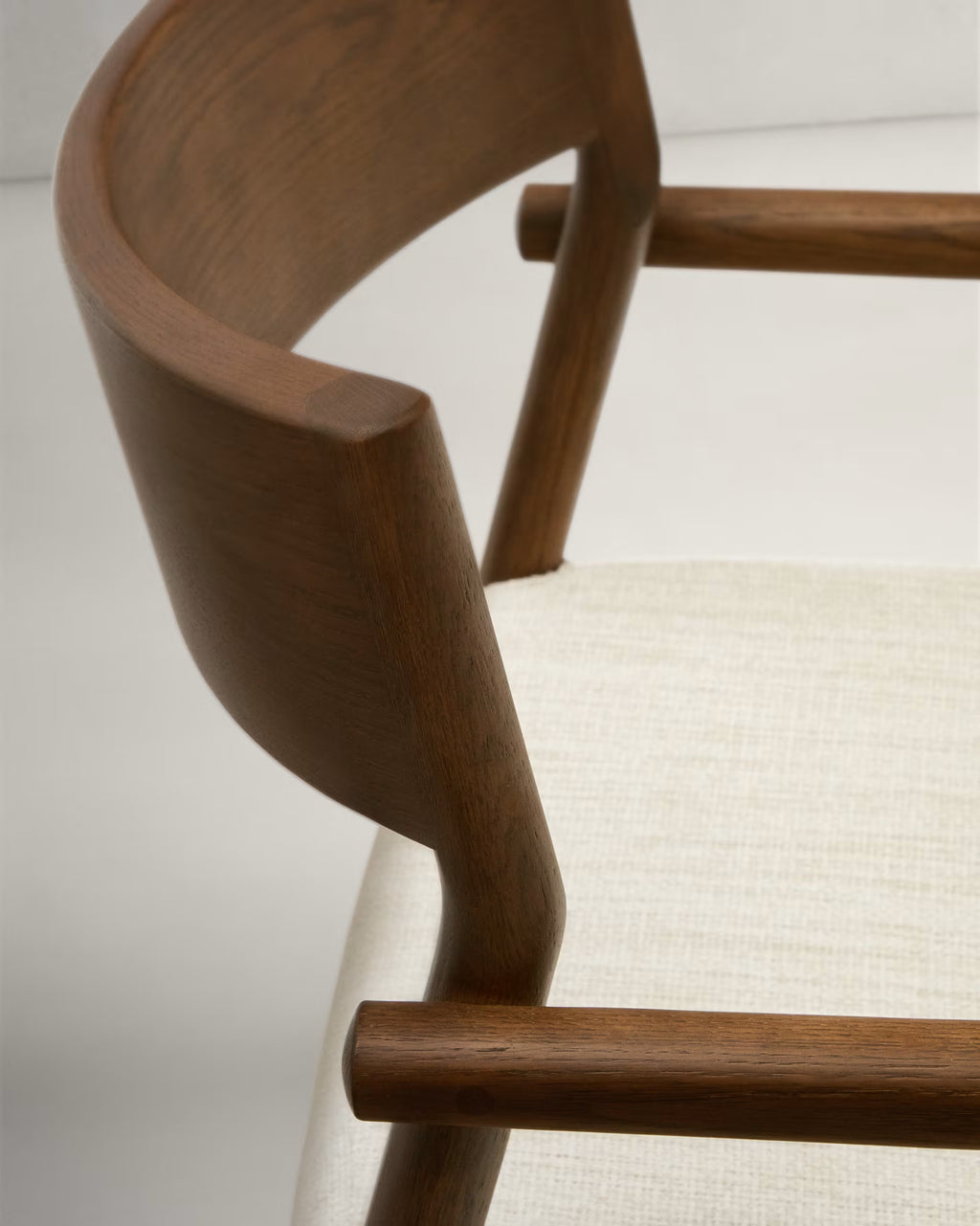 Falconera Chair in Walnut Finish.