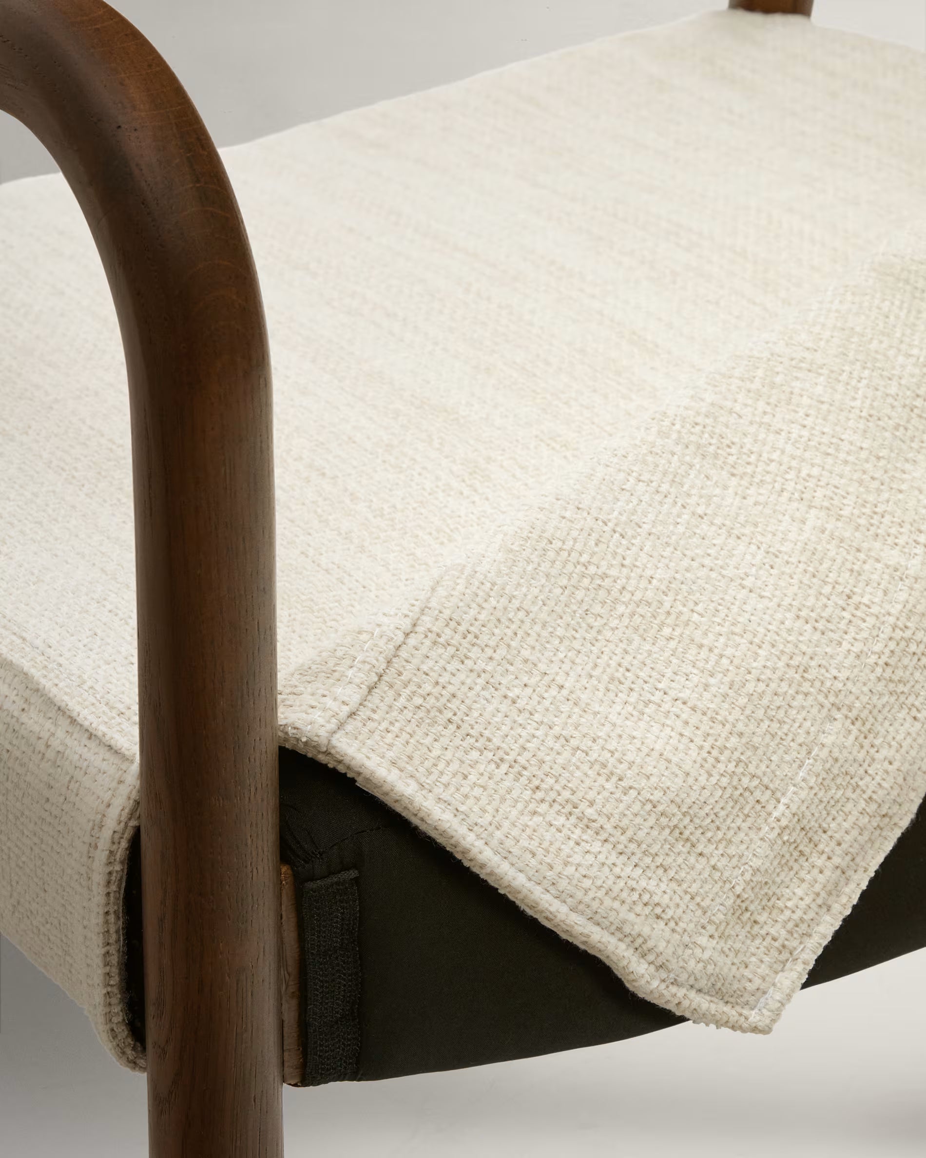 Falconera Chair in Walnut Finish.