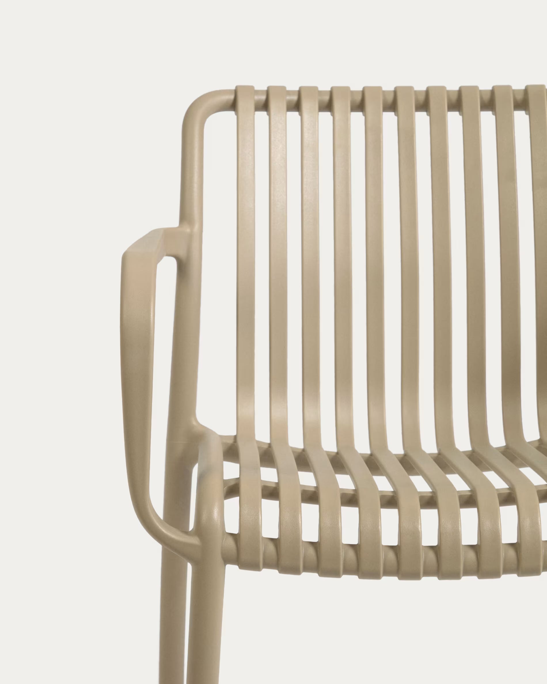 Isabellini stackable outdoor chair in beige.