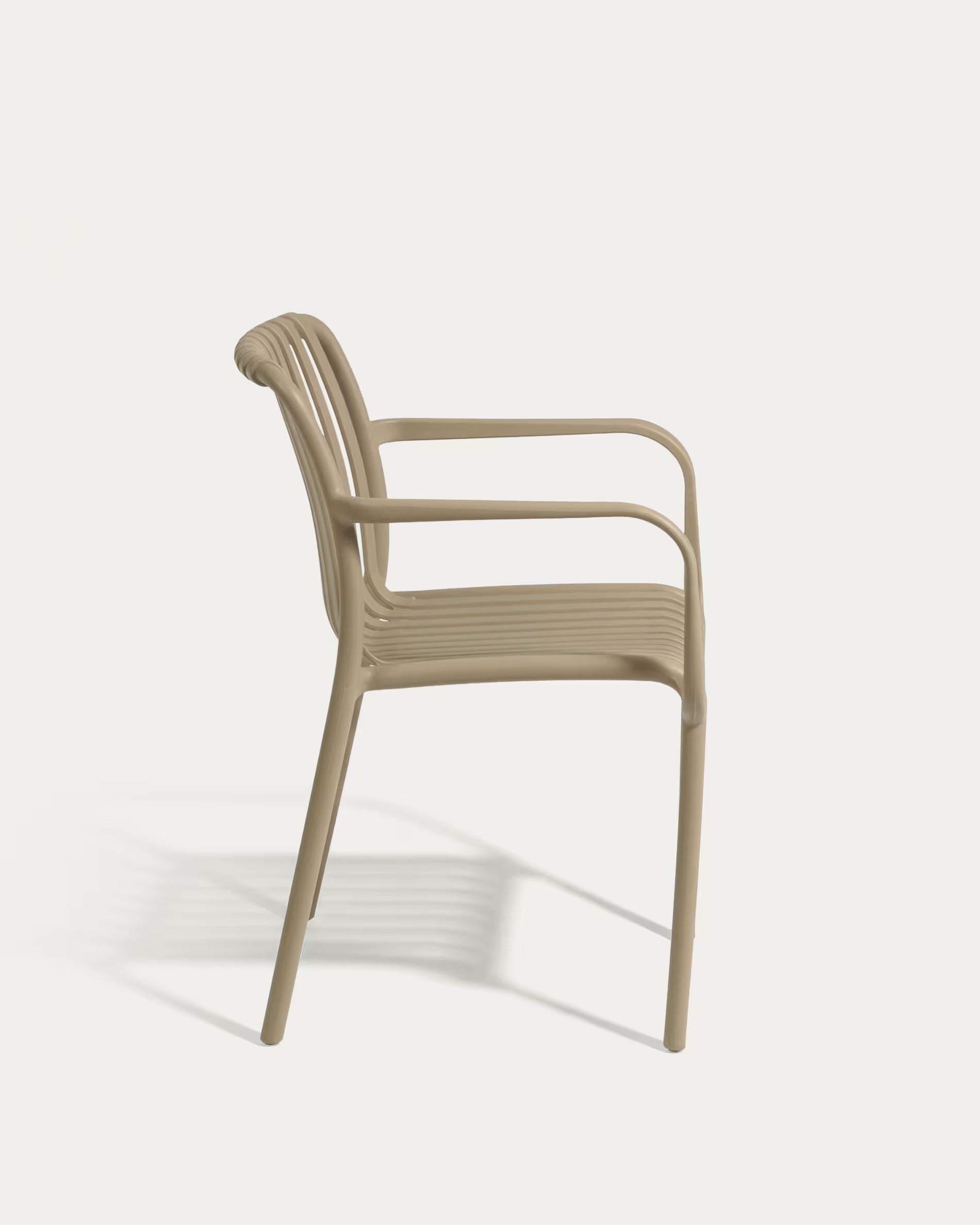 Isabellini stackable outdoor chair in beige.