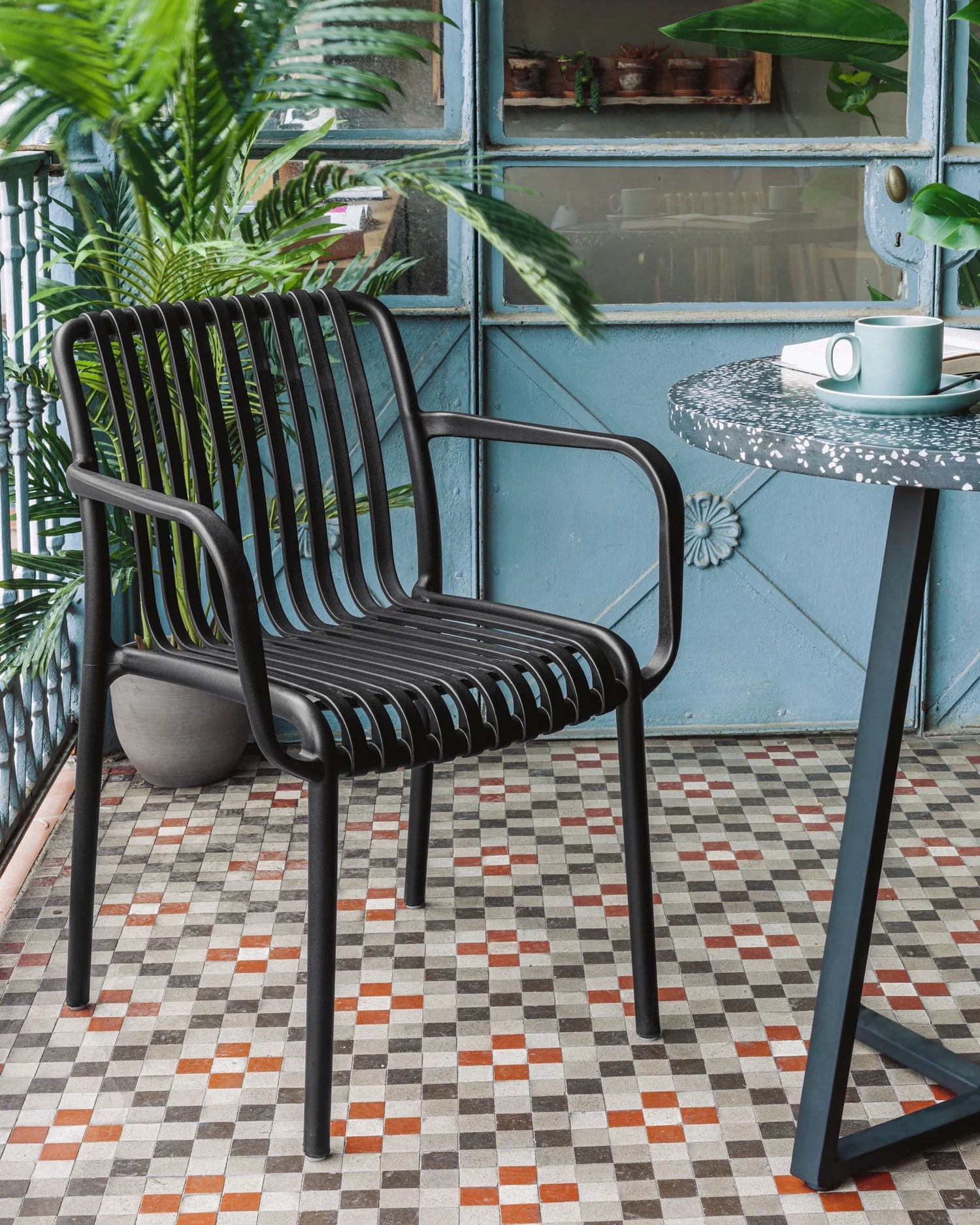 Isabellini stackable outdoor chair in black. 