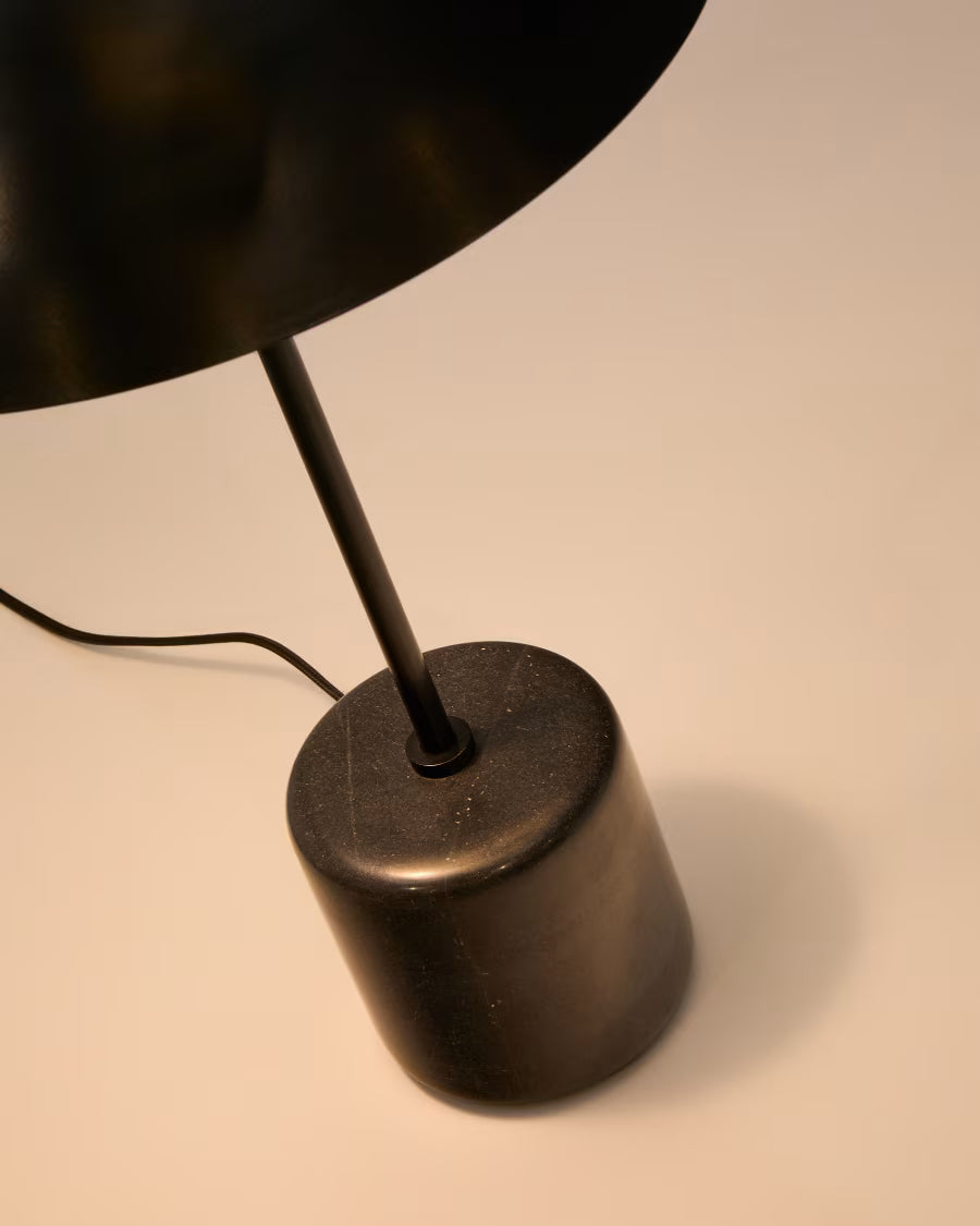 Sayra table lamp made of black marble and metal in a black painted finish